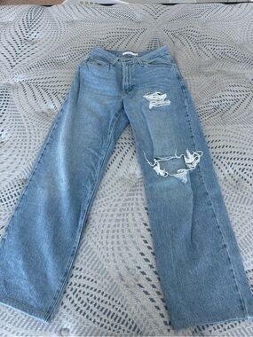 women’s Levi’s distressed wide leg 94 baggy jeans